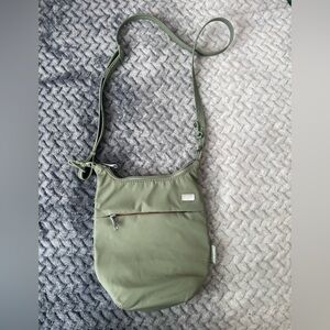 Pacsafe crossbody RFID blocking green bag